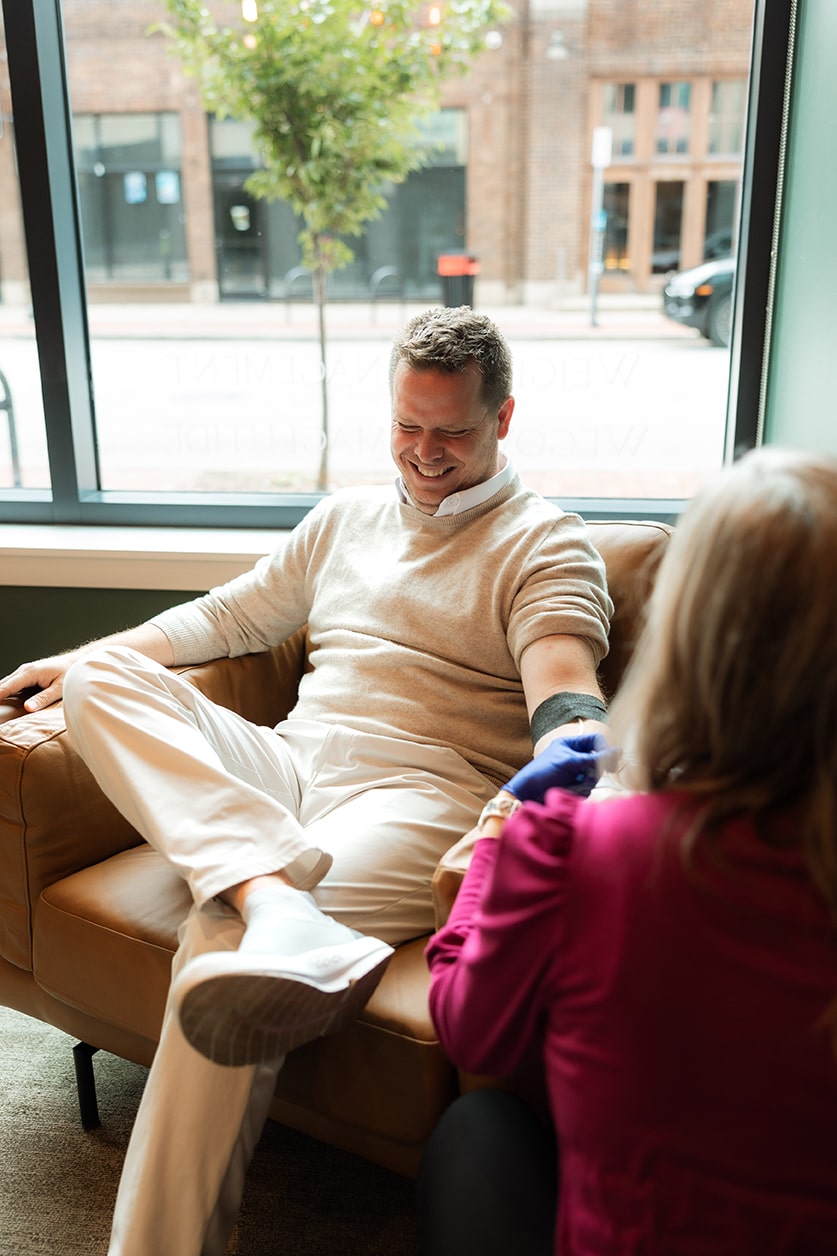 Person receiving IV Drip Therapy from Vivid IV Health